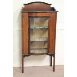 An Edwardian Bow-Fronted Inlaid Display Cabinet