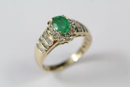 A 14ct Yellow Gold Emerald and Diamond Ring