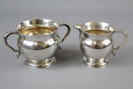 A Silver Twin-handled Sugar Bowl and Milk Jug