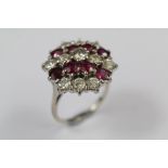 An 18ct Gold Ruby and Diamond Cluster Dress Ring