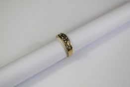 A 9ct Yellow Gold and Diamond Ring