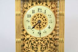 An Edwardian Ornate Brass Carriage Clock