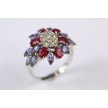 An 18ct White Gold Ruby Diamond and Sapphire Ring