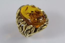 A Gentleman's Bespoke 18ct Yellow Gold and Amber Ring