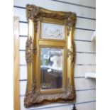 BEVELLED MIRROR & PLAQUE WITHIN AN ORNATE FRAME