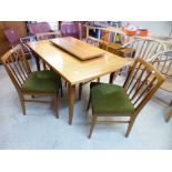 MID CENTURY EXTENDING TABLE & 4 CHAIRS
