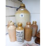 5 STONEWARE BOTTLES INCUDING, STONES LTD. SEAFORD & BEARD & CO. LEWES