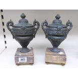 PAIR OF BRONZED SPELTER URNS ON MARBLE BASES 27 CMS HIGH