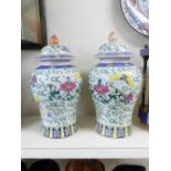 PAIR OF ORIENTAL TEMPLE VASES 40 CMS HIGH. BOTH A/F