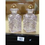 2 LILAC COLOURED GLASS DECANTERS WITH STOPPERS