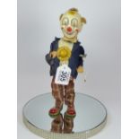 TIN PLATE CLOCKWORK CLOWN, RIGHT HAND MISSING 23 CMS HIGH, MADE IN JAPAN