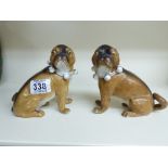 PAIR OF VICTORIAN CERAMIC PUGS 13 CMS HIGH, 1 WITH PART TAIL MISSING