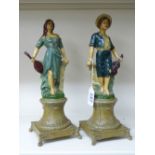 2 FRENCH PAINTED SPELTER FIGURES ON PLINTHS, MARKED TO REAR A.RUCHO 31 CMS HIGH