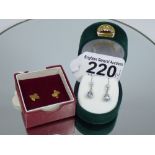 PAIR OF 9 CT WHITE GOLD EARRINGS WITH STONES + PAIR OF 9 CT GOLD EARRINGS. TOTAL WEIGHT 2.19 GRAMS