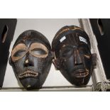 2 X CARVED AFRICAN MASKS