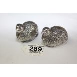 PAIR OF WHITE METAL SALT & PEPPER POTS IN THE FORM OF BIRDS