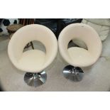 2 DWELL SWIVEL STOOLS