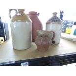 2 X SALT GLAZED CIDER FLAGONS ONE MARKED THE BREWERY, HURST + 2 EARTHENWARE JUGS