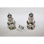 PAIR OF HALL MARKED SILVER BALUSTER SHAPED PEPPER POTS