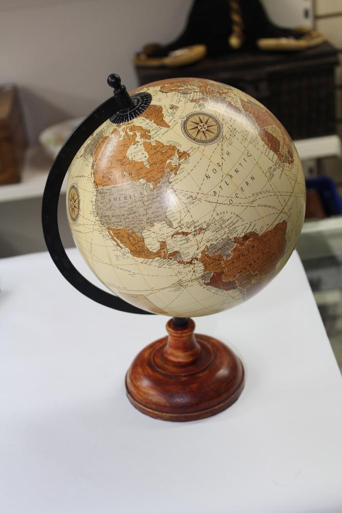 GLOBE - Image 2 of 2