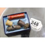 2 X HALL MARKED SILVER THIMBLES INCLUDING 1 X CHARLES HORNER + 3 OTHERS & A NEEDLE CASE