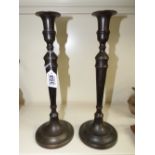 PAIR OF BRONZE CANDLESTICKS 35 CMS HIGH