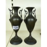 PAIR OF BRONZE URNS ON SLATE BASES 24 CMS