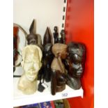 QUANTITY OF CARVED AFRICAN HEADS & FIGURES