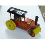 TIN PLATE CLOCKWORK STEAM ROLLER, MADE IN GREAT BRITAIN