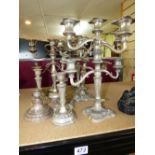 QUANTITY OF WHITE METAL CANDLESTICKS & CANDELABRAS