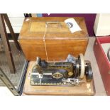 FRISTER & ROSSMANN SEWING MACHINE ALSO LABELLED HARRODS LTD, BROMPTON ROAD SW. IN INLAID WOODEN