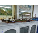 4 MODEL BOATS ON DISPLAY STANDS