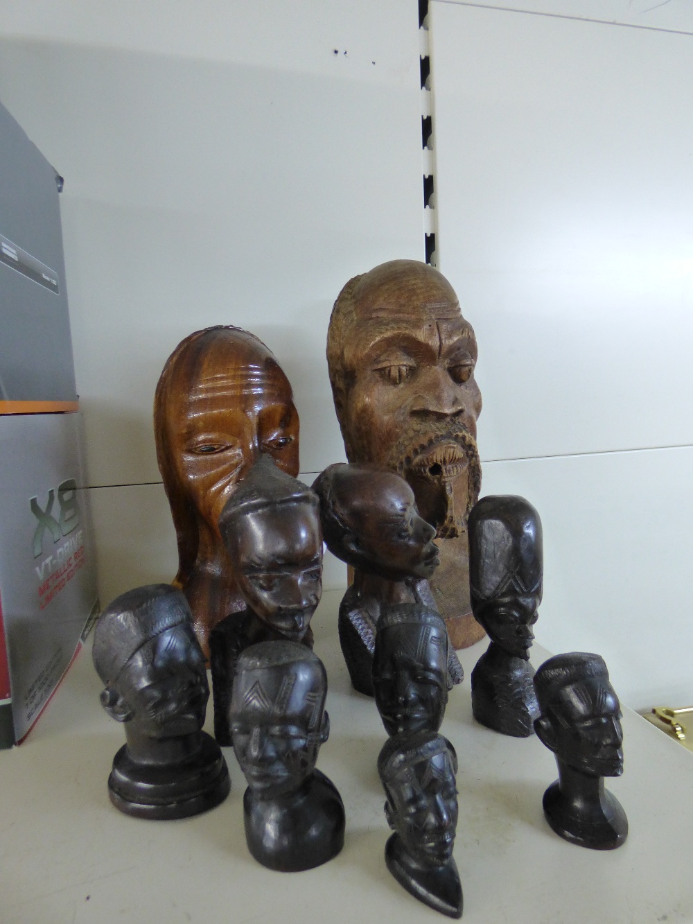 COLLECTION OF AFRICAN STYLE CARVED WOOD BUSTS