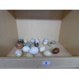 COLLECTION OF STONE EGG ORNAMENTS