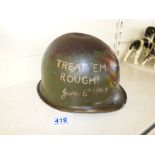 WW11 US M1 HELMET FOUND IN NORMANDY AND HAND PAINTED POST WAR