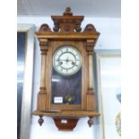 OAK FRAMED WALL CLOCK WITH PENDULUM