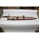 AFRICAN SHORT SWORD WITH EMBOSSED LEATHER SCABBARD + SPANISH ONAMENTAL SWORD