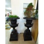 PAIR OF BLACK CAST IRON CAMPANA GARDEN URNS 112 CMS HIGH