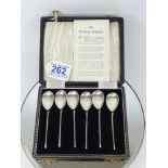 CASED SET OF HALLMARKED SILVER SPOONS IN THE STYLE OF 'THE ROMAN SPOON'