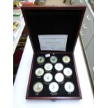 DANBURY MINT RACING LEGENDS MEDALLION COLLECTION BY GRAHAM ISOM, 22 CT GOLD PLATED MEDALLIONS