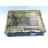 VICTORIAN BLACK LACQUERED & GILT DECORATED LADIES WRITING SLOPE, THE LID WITH PAINTED LANDSCAPE