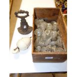 BOX OF GLASS STOPPERS AND CAST IRON DOOR STOP