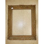 AN ORNATE PICTURE FRAME, (80 x 66 CMS APPROX)