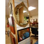 LARGE OVAL MIRROR IN GILT FRAME AND A GUINNESS ADVERTISING / BAR MIRROR
