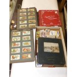 CIGARETTE CARD COLLECTION IN 4 ALBUMS AND SOME LOOSE CARDS