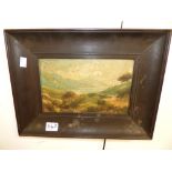 A LATE 19TH / EARLY 20TH OIL CENTURY PAINTING ON BOARD OF A MOUNTAIN LANDSCAPE BY A LAKE, FRAMED. 27