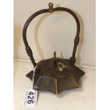 LATE 19TH / EARLY 20TH CENTURY ORIENTAL BRONZE OIL LAMP WITH SWING HANDLE