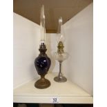 A LATE 19TH / EARLY 20TH CENTURY OIL LAMP, TOGETHER WITH ANOTHER