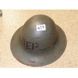 A WWII "SFP" MILITARY HELMET, MARKED TO LINER EUL1941,7