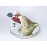 BESWICK #850 : A CERAMIC FIGURE OF A PHEASANT IN FLIGHT - 14.5 CM TALL